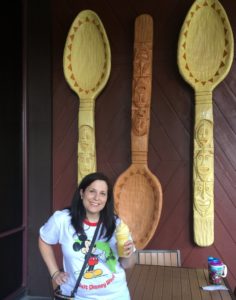 Disney travel agent eating Dole Whip at Pineapple Lanai at Disney’s Polynesian Village Resort